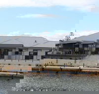 Port Bouvard Retreat - Large Family Friendly Canal Home with Private Jetty - Surfers Gold Coast