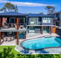 Vukeville beachfront luxury with pool 4pm Check Out Sundays - Surfers Gold Coast