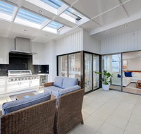 Whispering Sands' 10 Sandy Point Road - Luxury waterfront home with aircon WIFI  Foxtel - Surfers Gold Coast