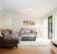 3-Bed Home with BBQ Patio near Parks and Playgrounds - Surfers Gold Coast